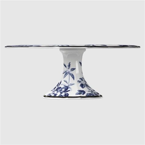 Herbarium cake stand in blue and white porcelain .